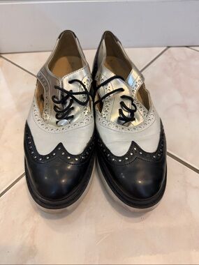 Classic Two-Tone Wingtip Oxfords in Black and White